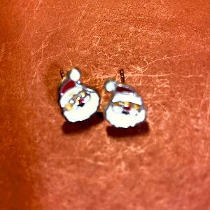 One pair enamel Santa Claus stud earrings. New condition. Very well crafted.